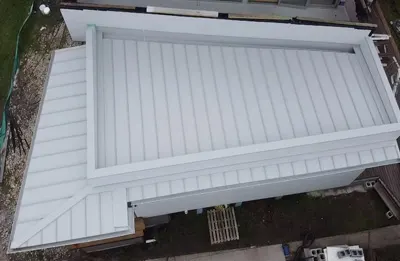 Standing-seam metal installation (aerial) — Central Coast