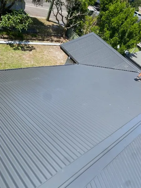 Freshly coated commercial metal roof, aerial view, Central Coast